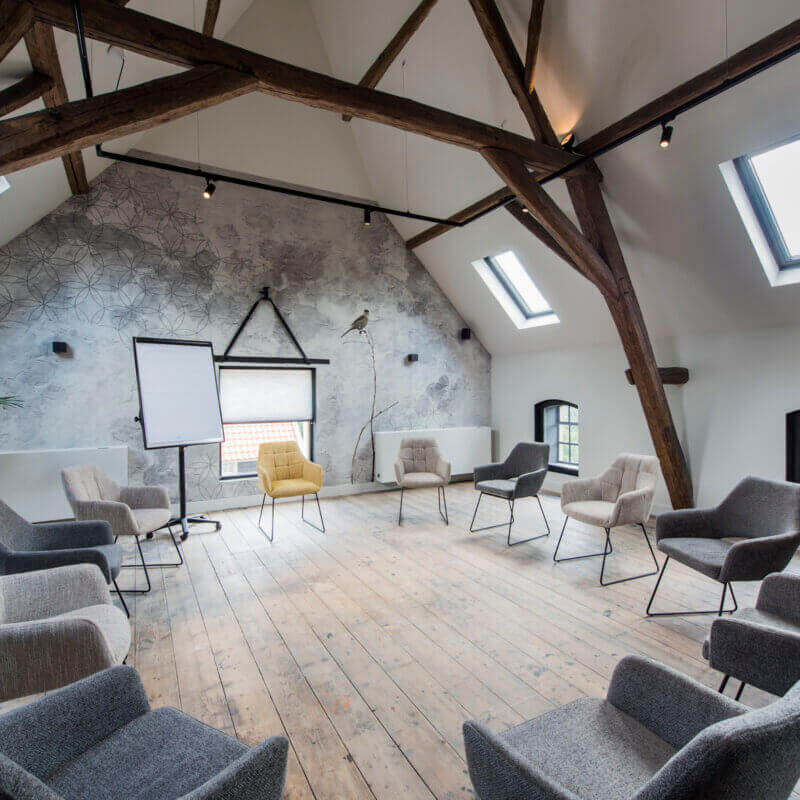 Trainingsruimte Oogst met stoelen in kringopstelling voor sessies en workshops